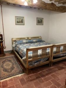 A bed or beds in a room at San Martino Vald'Afra