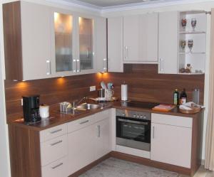Kuchyň nebo kuchyňský kout v ubytování Ferienwohnung am Rosengarten