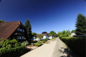 a cobblestone driveway in front of a house at Holiday park- Winnetou in Waldbrunn