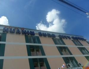 a building with a bluevisor on top of it at Hua Hin Euro City Hotel in Hua Hin