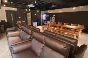 Posezení v ubytování Business Capsule Hotel Lightning Hotel Asakusa