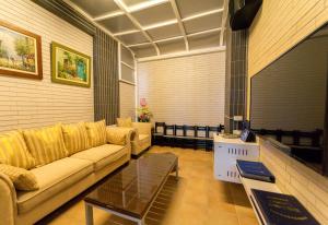 Area soggiorno di Sky Young Homestay