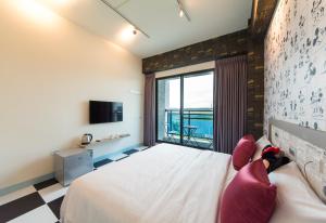 Letto o letti in una camera di Sky Young Homestay