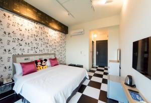 Letto o letti in una camera di Sky Young Homestay