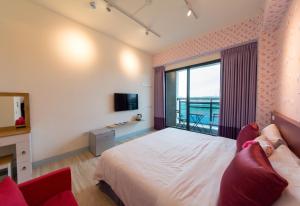 TV o dispositivi per l'intrattenimento presso Sky Young Homestay