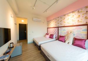 Letto o letti in una camera di Sky Young Homestay