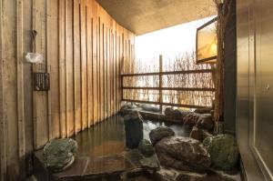 Posezení v ubytování Dormy Inn Mishima