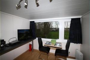 TV a/nebo společenská místnost v ubytování Studio Dahlia 2p