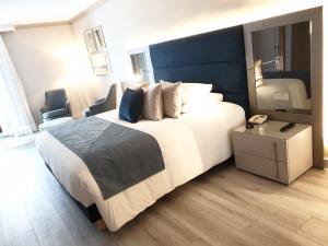 Postel nebo postele na pokoji v ubytování Boutique Hotel B51