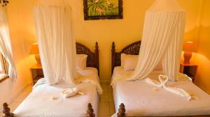 Cama o camas de una habitación en Hotel Suma