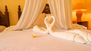 Cama o camas de una habitación en Hotel Suma