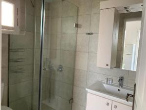 A bathroom at Anastasios Olive Garden Apartments