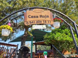 a sign that reads casa rota at a restaurant at Casa Roja in Faralya
