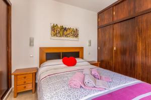 Katil atau katil-katil dalam bilik di Apartamento Correia