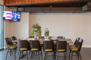 TV a/nebo společenská místnost v ubytování Best Western Plus Hotel Amstelveen