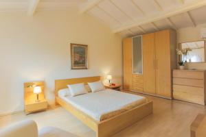 Ένα ή περισσότερα κρεβάτια σε δωμάτιο στο CASA DI DANTE +47 φωτογραφίες