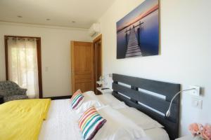 Postel nebo postele na pokoji v ubytování La Ghisonaise Maison d'hôtes