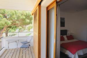 Postel nebo postele na pokoji v ubytování La Ghisonaise Maison d'hôtes