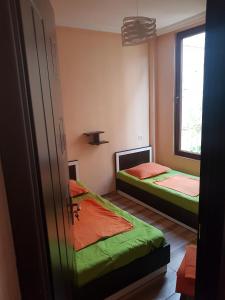 Voodi või voodid majutusasutuse Apartment Nodmax toas