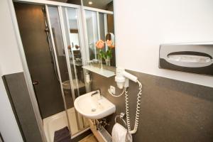 Koupelna v ubytování Hotel Heigl