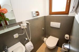 Koupelna v ubytování Hotel Heigl
