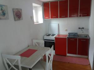 Kuchyňa alebo kuchynka v ubytovaní Apartment Vucurovic
