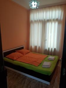 Voodi või voodid majutusasutuse Apartment Nodmax toas