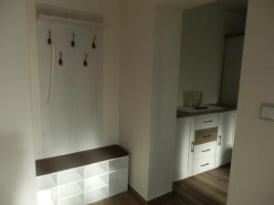 Kuchyňa alebo kuchynka v ubytovaní Apartmány 27