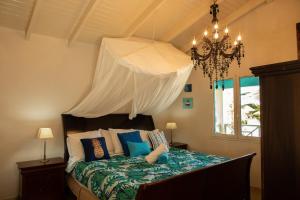 Postel nebo postele na pokoji v ubytování Ocean Blue Bonaire + 13 fotografií