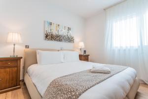 Palazzo Violetta客房内的一张或多张床位