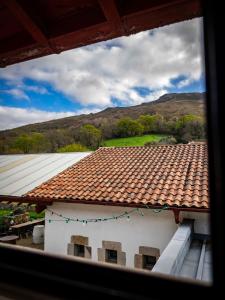 a view from a window of a building with a roof at Achafla Baita in Ascain