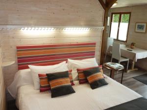 Llit o llits en una habitació de Les Bruyères du Mont