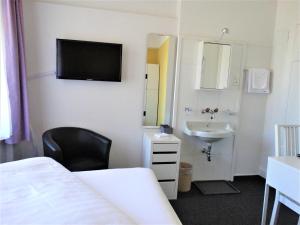 Koupelna v ubytování Hotel Bündnerhof + 37 fotografií