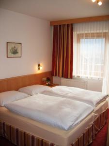 Postel nebo postele na pokoji v ubytování Pension Koch