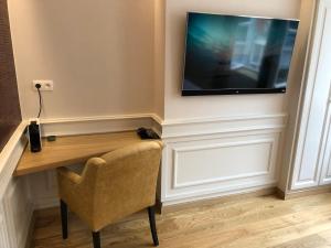 TV a/nebo společenská místnost v ubytování Merveilleux