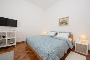 Posteľ alebo postele v izbe v ubytovaní Stefani Studio Apartman + 19 fotografií