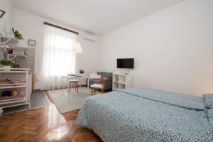 Posteľ alebo postele v izbe v ubytovaní Stefani Studio Apartman