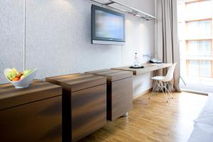 TV a/nebo společenská místnost v ubytování Factory Hotel