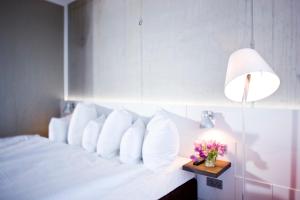 Postel nebo postele na pokoji v ubytování Factory Hotel
