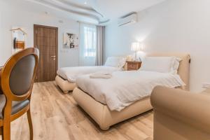 Palazzo Violetta客房内的一张或多张床位
