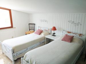 Postel nebo postele na pokoji v ubytování B&B dei Laghi