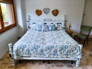 Postel nebo postele na pokoji v ubytování B&B dei Laghi