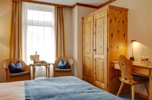 Postel nebo postele na pokoji v ubytování Hotel Meierhof