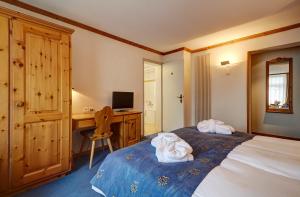 Postel nebo postele na pokoji v ubytování Hotel Meierhof