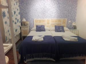 Postel nebo postele na pokoji v ubytování Casa rural El Rincón