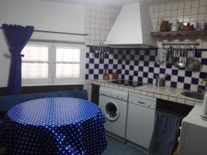 Kuchyň nebo kuchyňský kout v ubytování Casa rural El Rincón