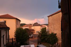 a view of a city street with buildings at Maison de Maitre I in Availles-Limouzine