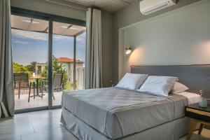 Postel nebo postele na pokoji v ubytování Villa Begonia + 17 fotografií
