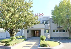aldo building with trees in front of it at Lido Hotel in Johannesburg