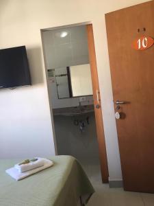 TV a/nebo společenská místnost v ubytování Hotel Paulista